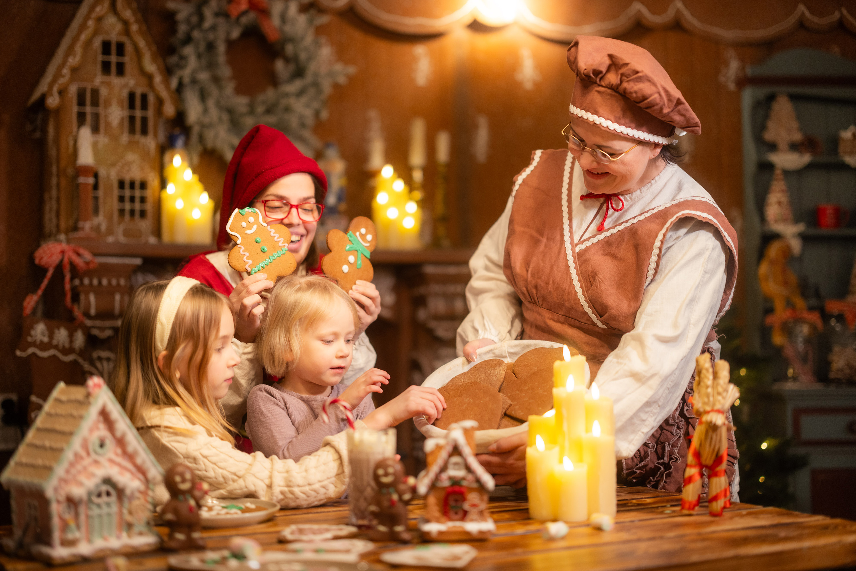 Children enjoying Christmas fun with elves and Mrs. Gingerbread at SantaPark.